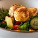fruit salad with fried goat cheese